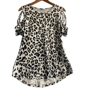 ADREAMLY NWT leopard print top. Open shoulders and crisscross straps. Womens M
